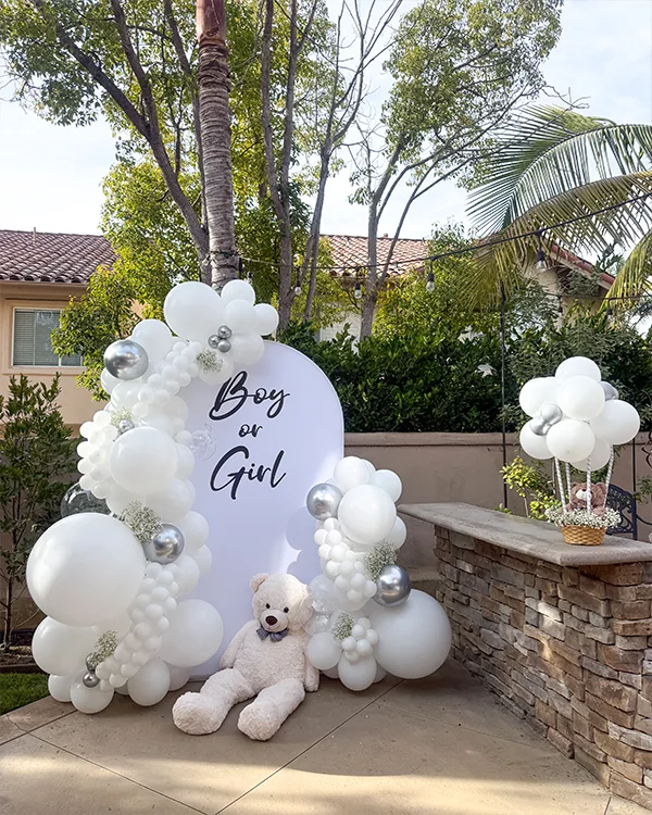 Taylor's Gender Reveal — Boy or Girl — Gender Reveal balloon decor detail Laguna Niguel