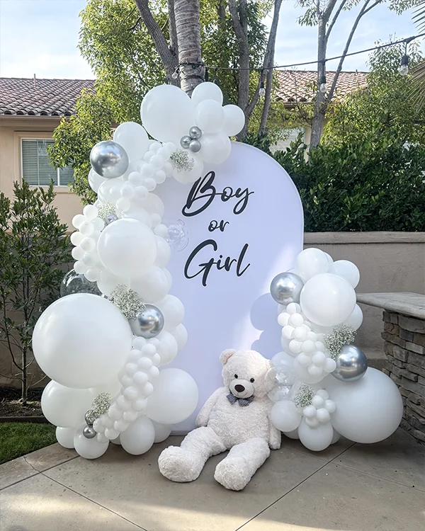 Taylor's Gender Reveal — Boy or Girl — Gender Reveal balloon decor detail Laguna Niguel